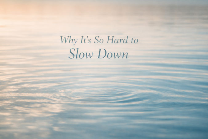Calm water with gentle ripples and soft text reading “Why It’s So Hard to Slow Down.”